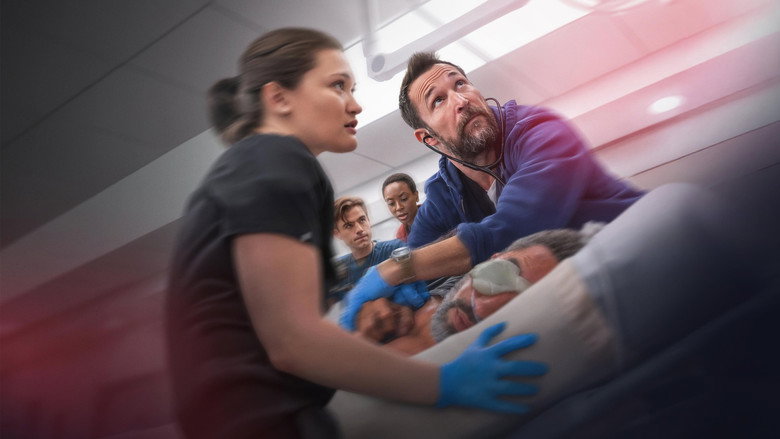 The team stabilizing a critical patient
